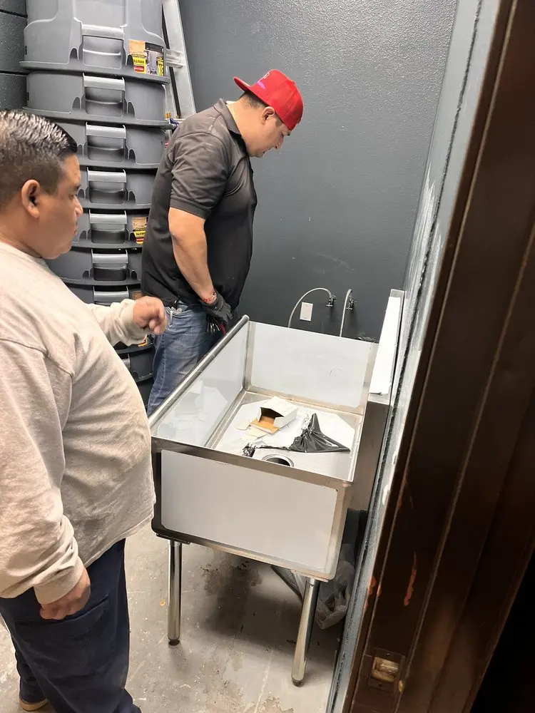 Commercial plumbing and sink installation in Varnum
